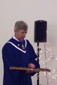 The Heavenly Choirmaster leads everyone in song.