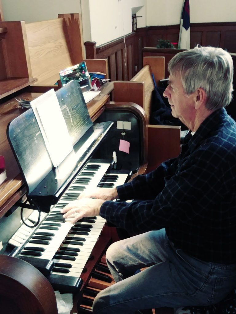 Bob Swope at the organ keyboards